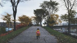 A Child wearing a backpack