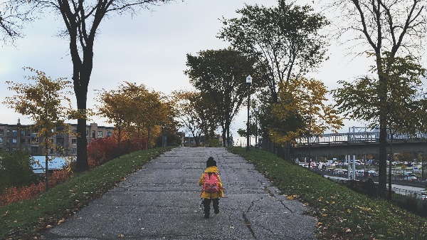 A Child wearing a backpack